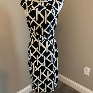 Navy dress with turquoise and white accents, only been worn a couple time.